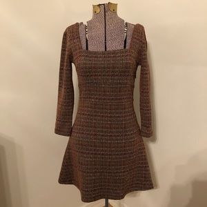 Free people long sleeve mini dress with square cut. Very retro look.